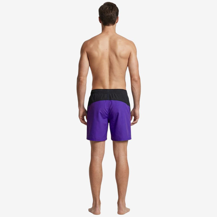Man from behind wearing black and purple Speedo Sport Splice 16" Watershorts with a drawstring waist.