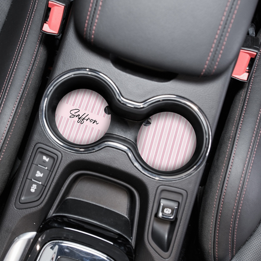 Personalised car coaster with pink and white stripes, Saffron name in black and red accent detail.