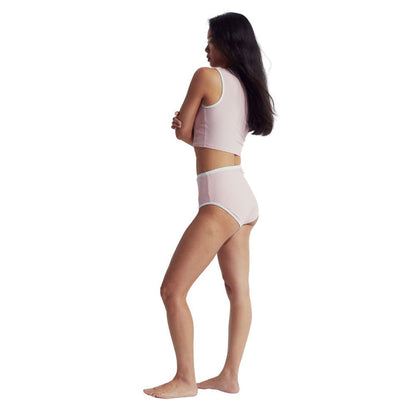 Speedo Wavechasers 2.0 pink high-waisted swim bottom with white trim, worn by a woman.
